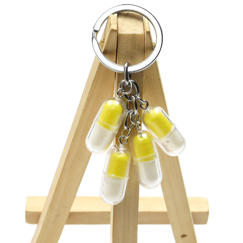 Wholesale Acrylic Cute Smiley Face Capsule Pendant Keychain