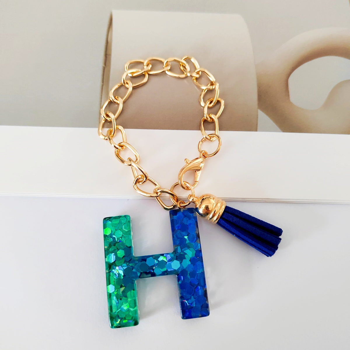 Wholesale Mixed color blue English letter keychain