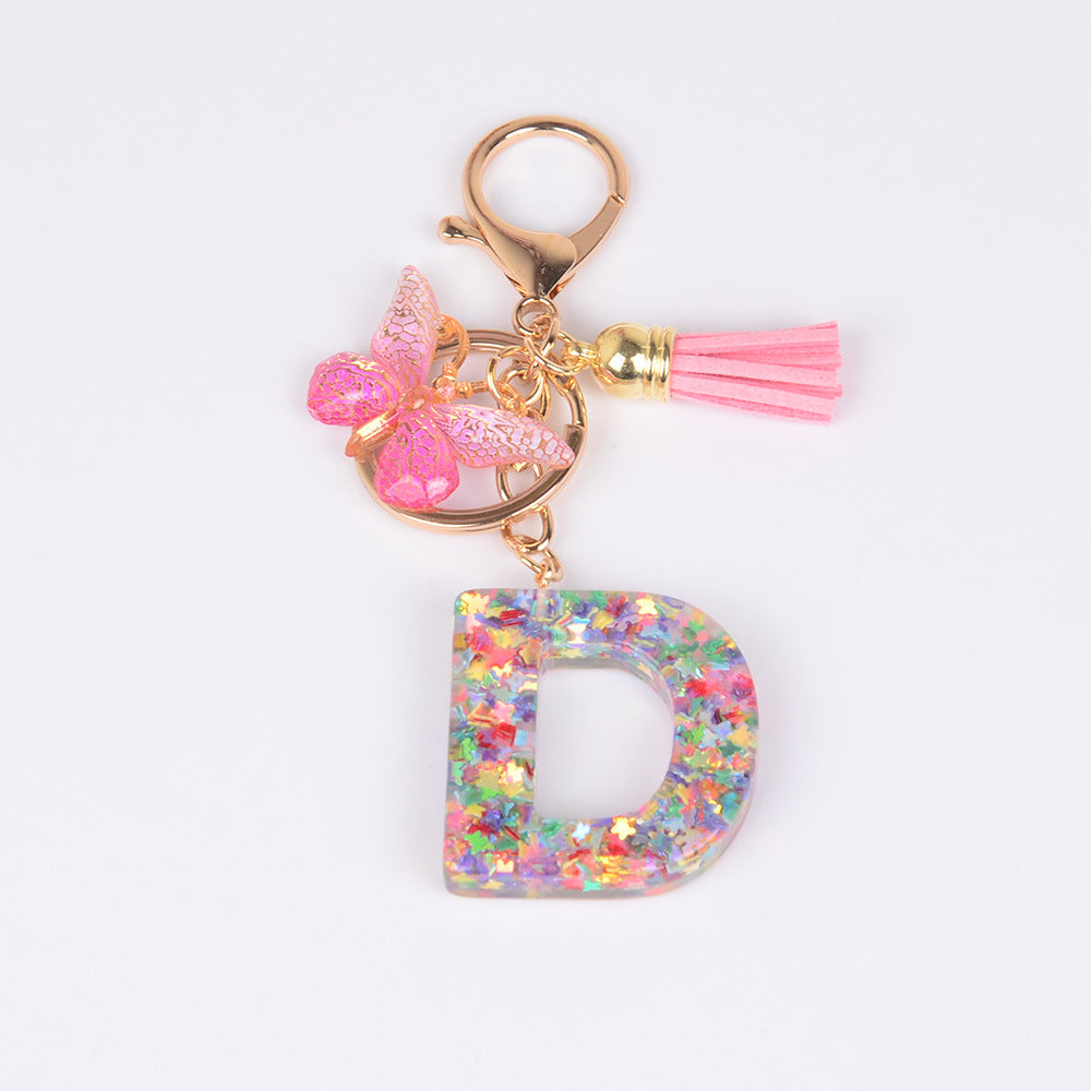 卸売スパンコール英語蝶タッセル文字樹脂キーホルダー