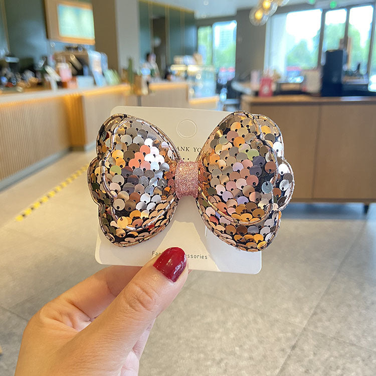 Central de pelo de arco de lentejuelas al por mayor