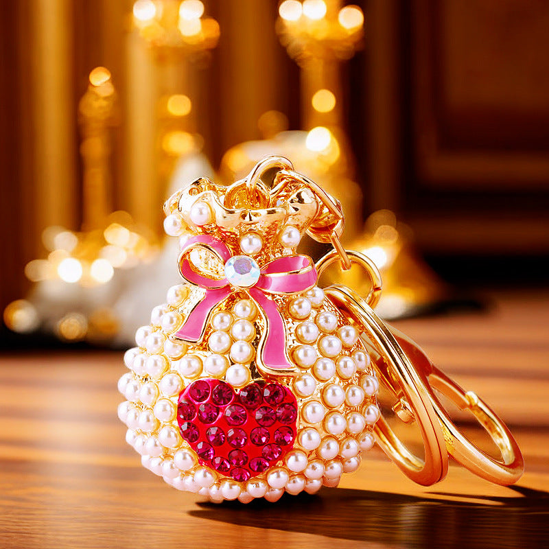 Wholesale Metal Pearl Heart Lucky Bag Keychain Cute Car Key Accessory Bag Charm For Women Gift