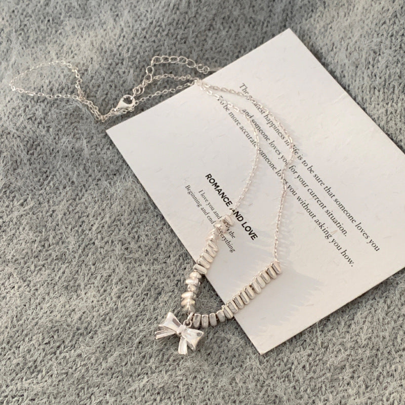 Wholesale broken silver bow necklace sweater chain copper necklace