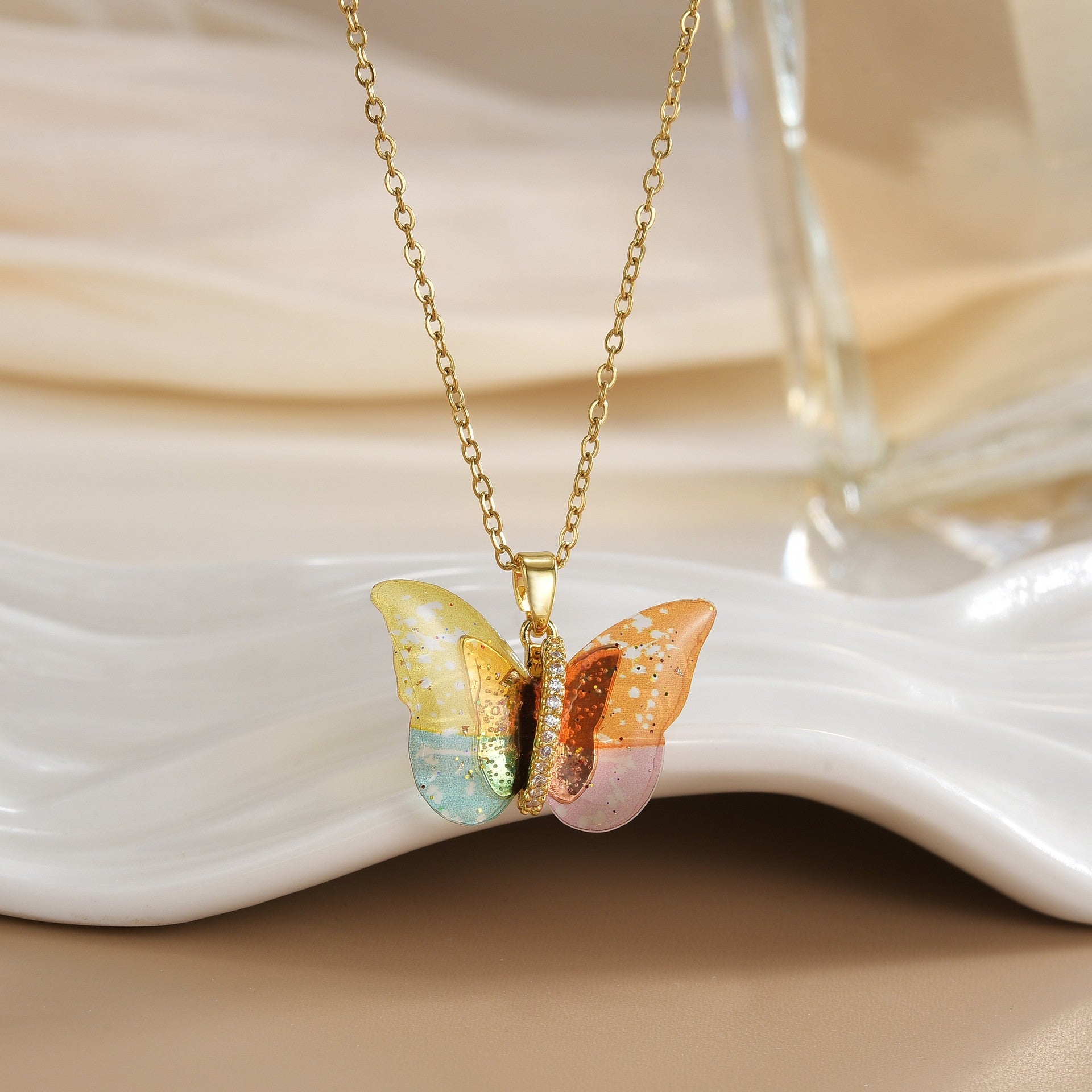 Wholesale Colored resin butterfly titanium steel locking chain