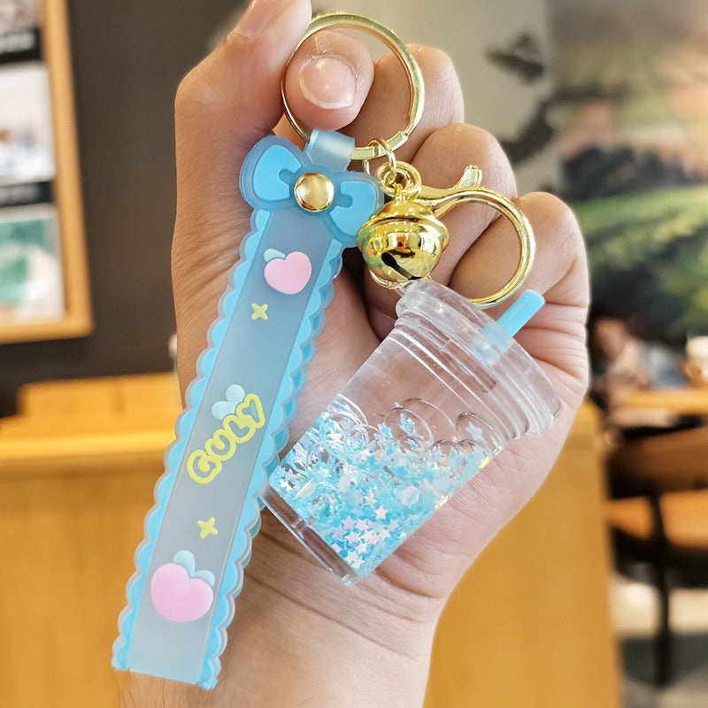 Wholesale quicksand luminous cup keychain liquid oil drift bottle pendant