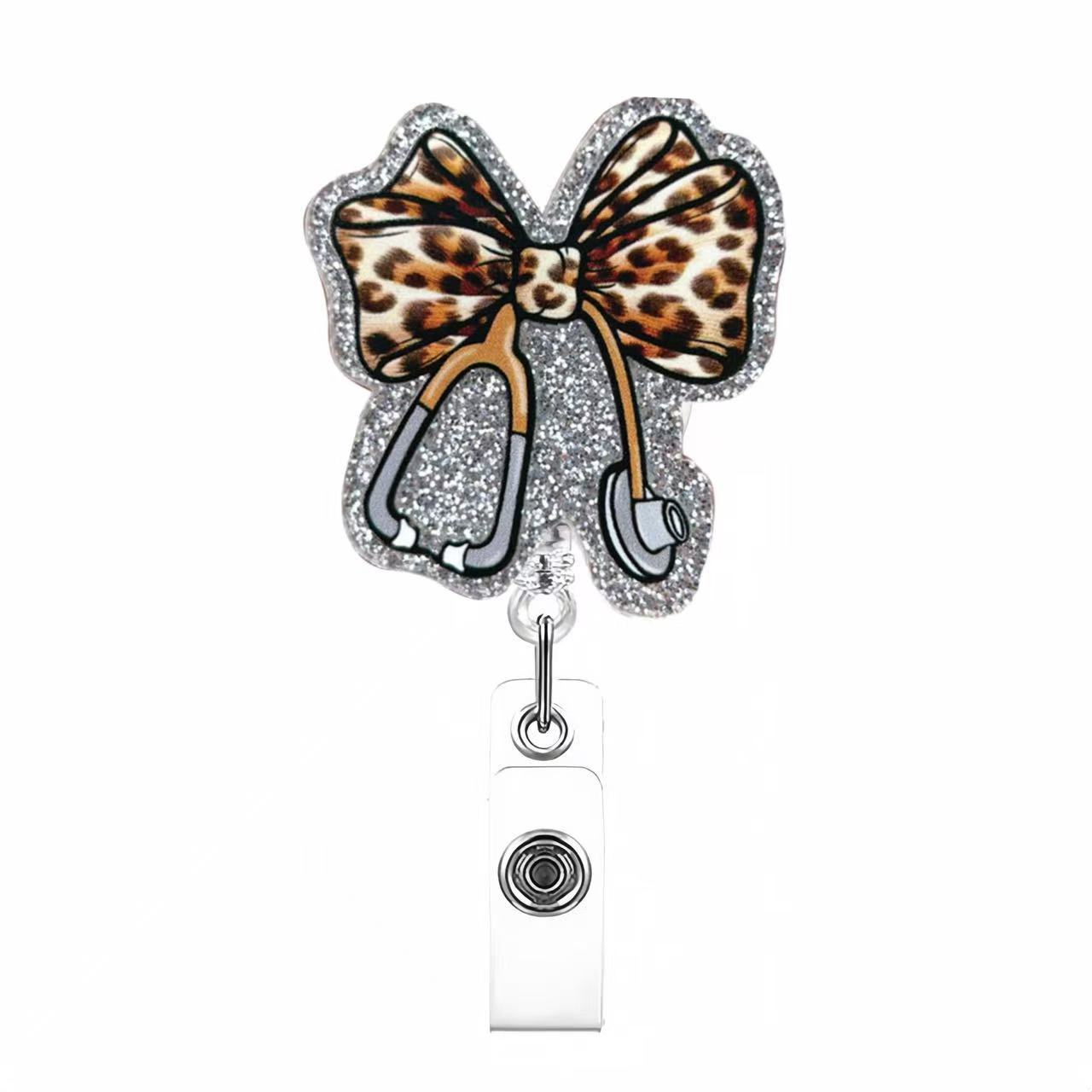 Wholesale Pink cherry medical staff with diverse bows Badge Reels