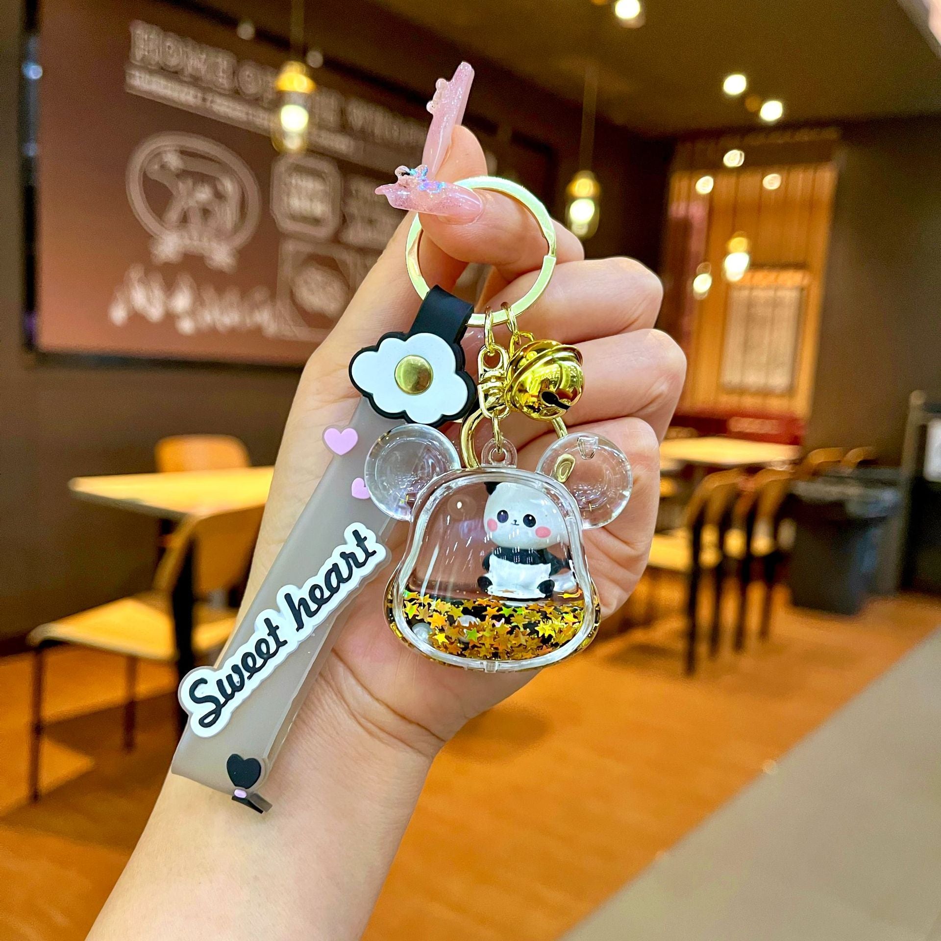 Wholesale Black gold floating cartoon cute panda Liquid Keychains