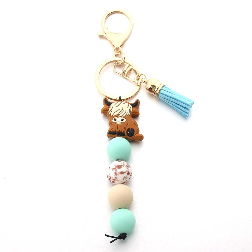 Wholesale Silicone Bead Cartoon Cow Keychain Bag Charm For Couple Birthday Gift And Everyday Use