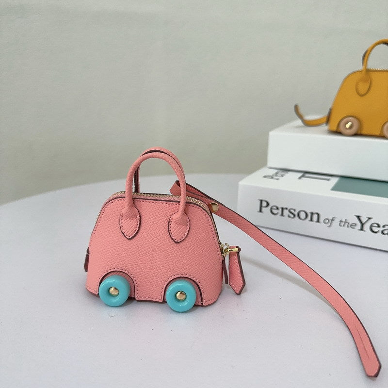 Wholesale Mini wheel shell bag cute lipstick earphone bag