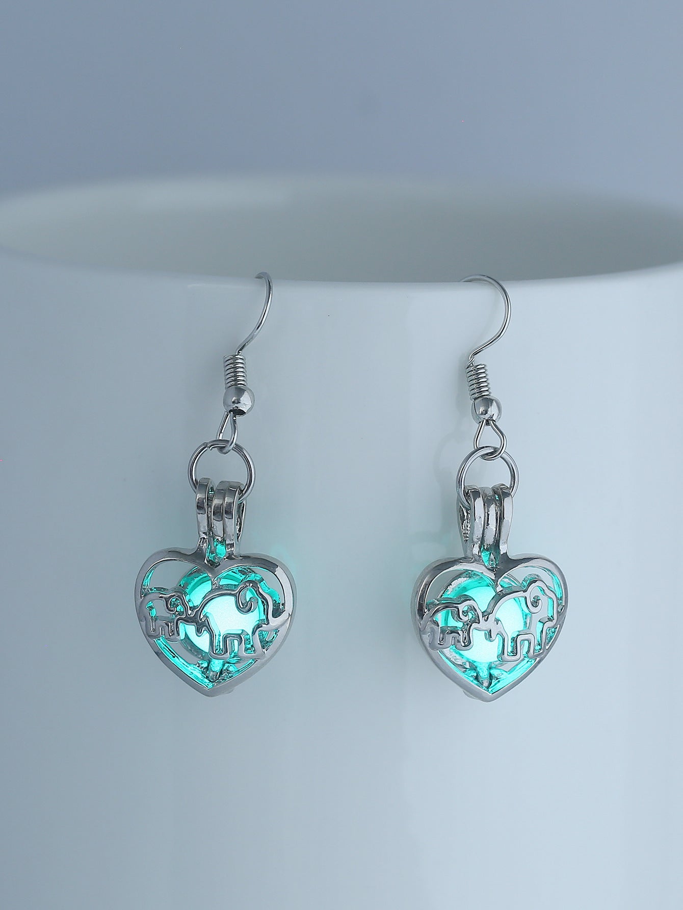 Wholesale Animal elephant baby elephant love hollow luminous earrings