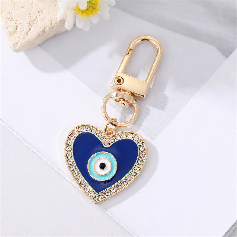 Wholesale Diamond Drop Oil Heart Blue Eyes Keychains