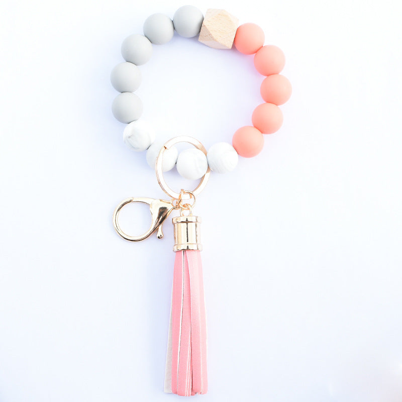 Wholesale Food Grade Silicone Beads Leather Tassel Wood Beads Bracelet Keychain