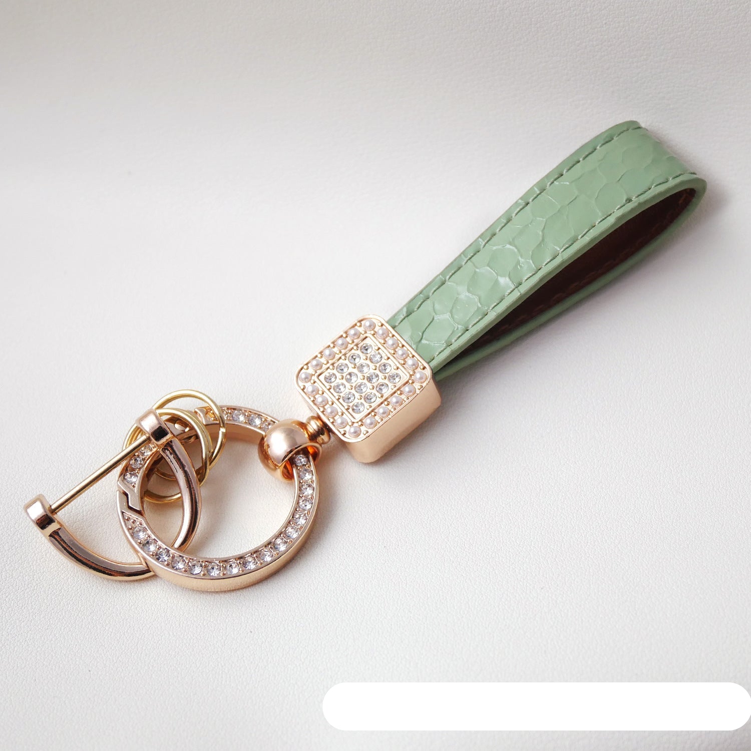 Wholesale Fashionable textured diamond spring ring keychain