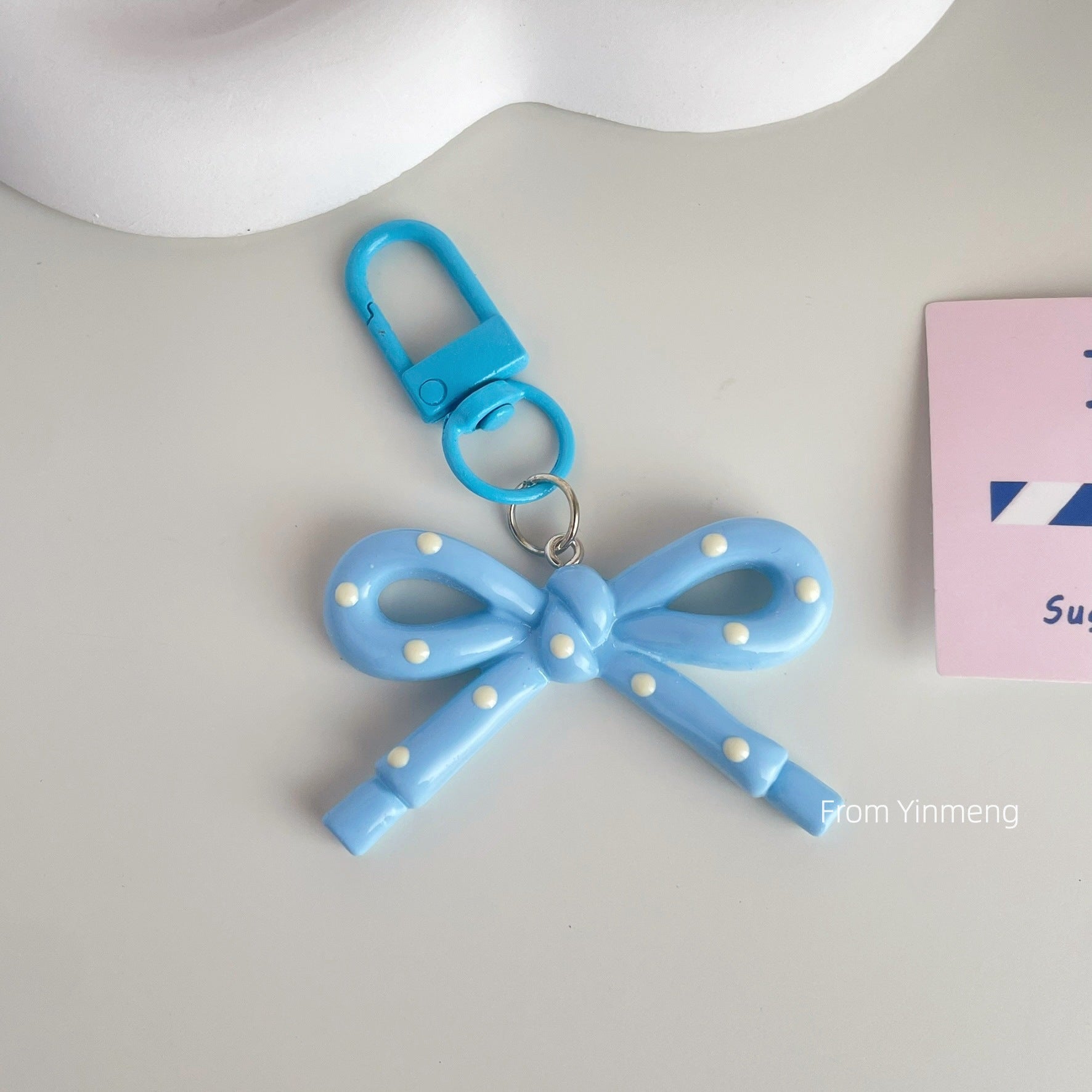 Wholesale spring and summer candy-colored hollow butterfly bow keychain