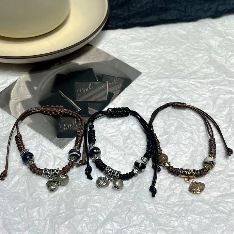 Wholesale Vintage Ceramic Bells Safety Lock Handwoven Rope Bracelets
