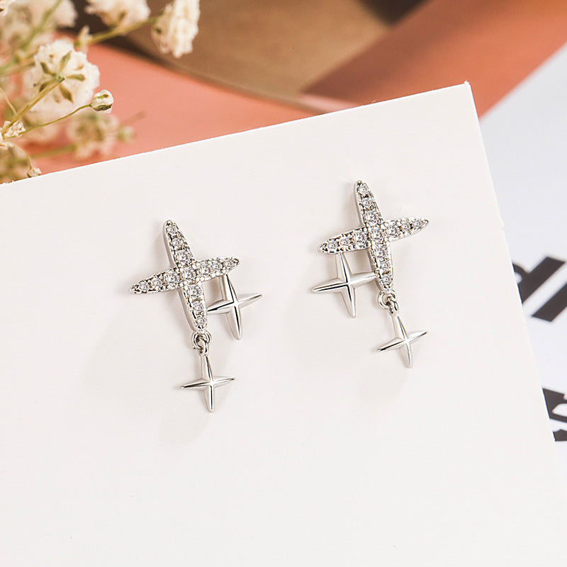 Pendientes al por mayor de cobre de diamantes estrella de cuatro puntajes