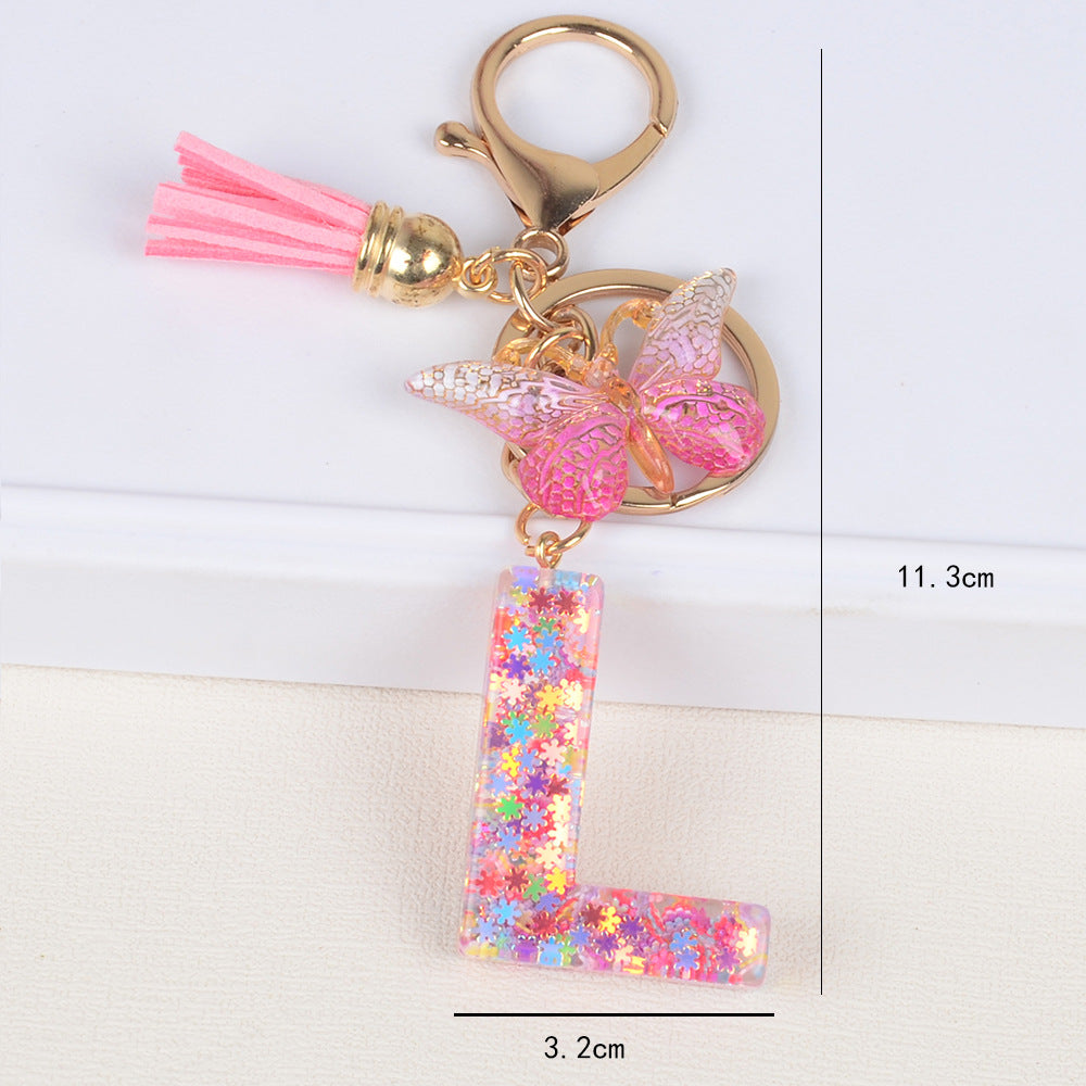 卸売スパンコールスノーフレークレター樹脂キーホルダー