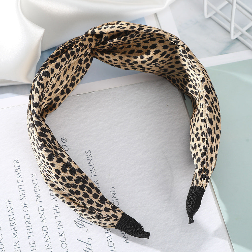 Wholesale Ancient Leopard Pattern Cross Fabric Hair Hoop