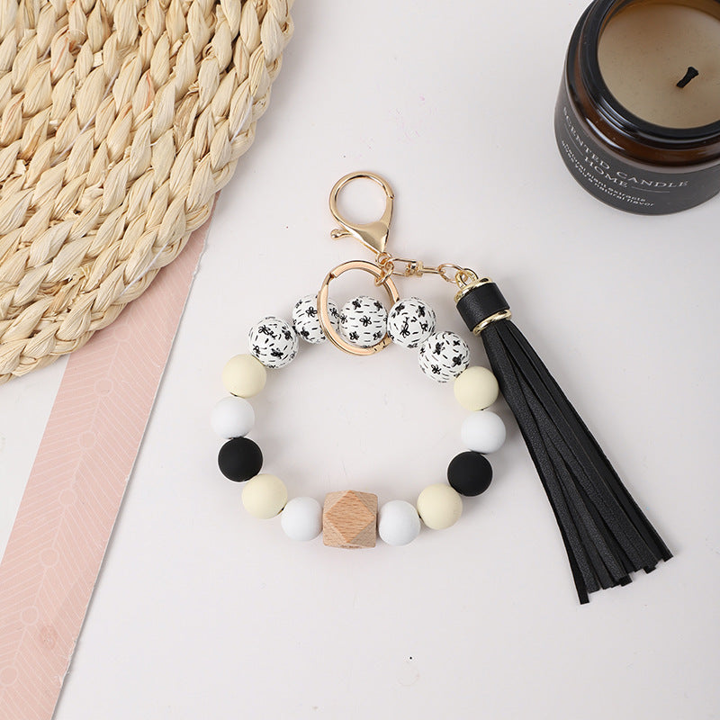 Llavero de muñeca de silicona de borla al por mayor