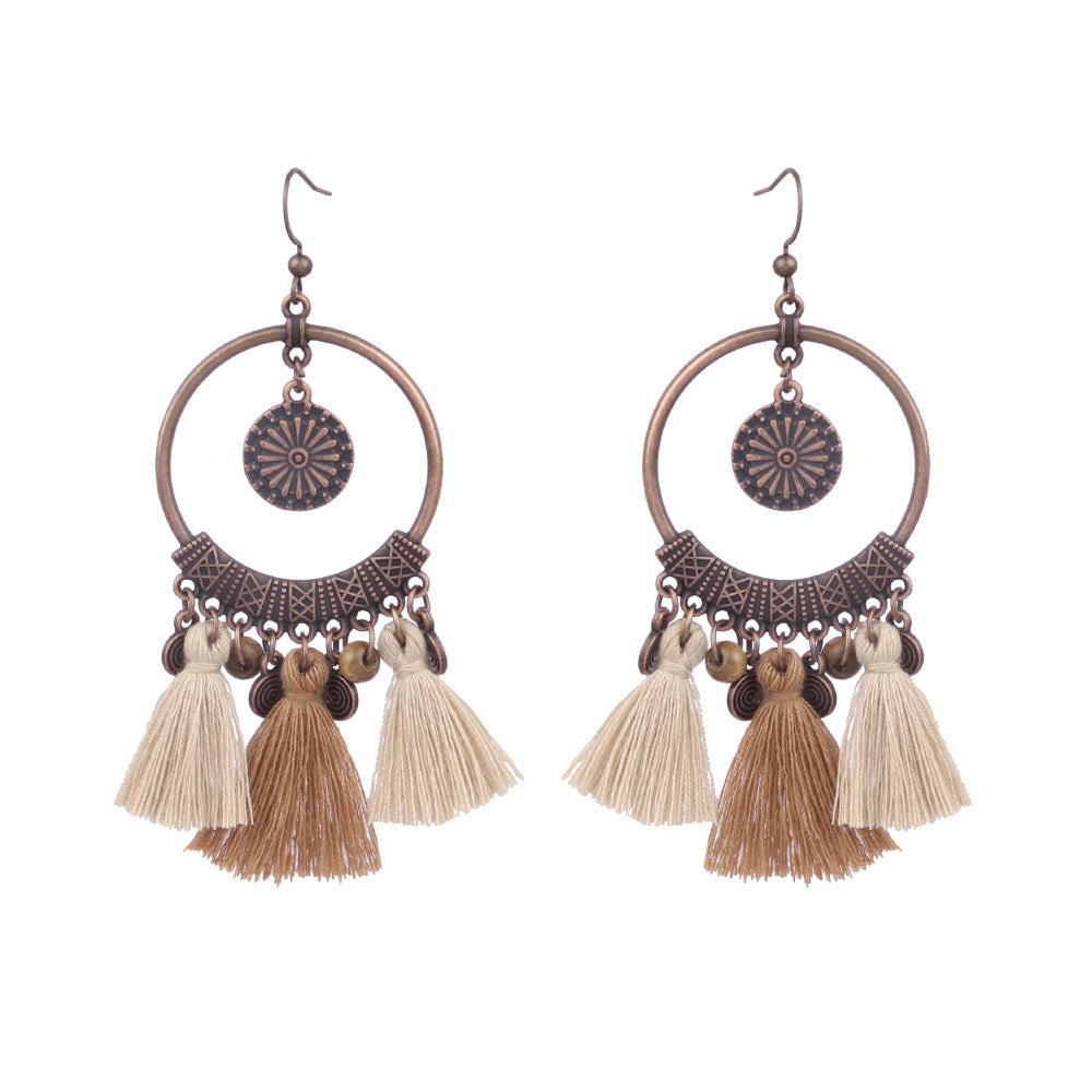 Wholesale Bohemian Rice Pearl Shell Long Tassel Earrings
