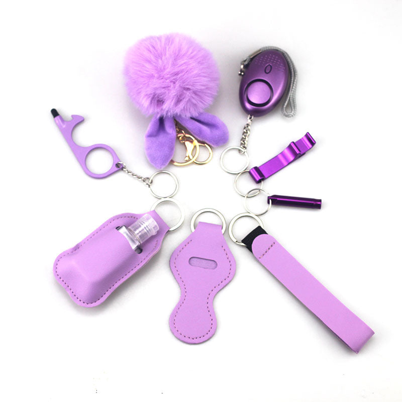 Wholesale Outdoor Whistle Hand Sanitizer Leather Case Fur Ball Key Chain Set