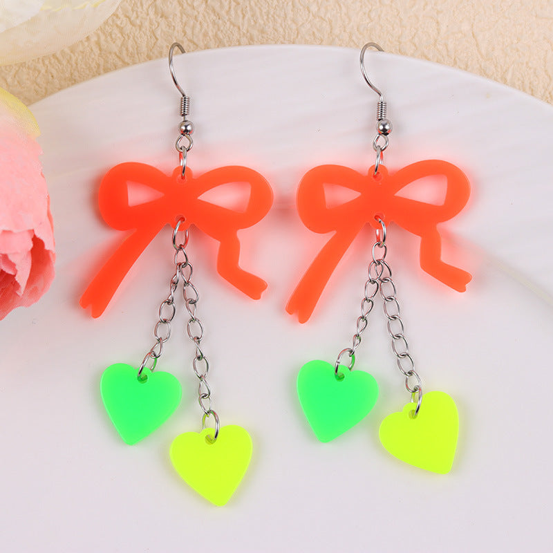 Wholesale Valentine' s Day fluorescent bow heart acrylic earrings