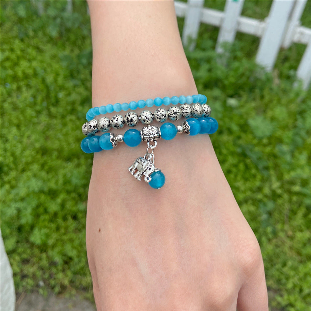Cuentas de piedra natural al por mayor cuentas de piedra volcánica colgante de elefante de tres capas pulsera