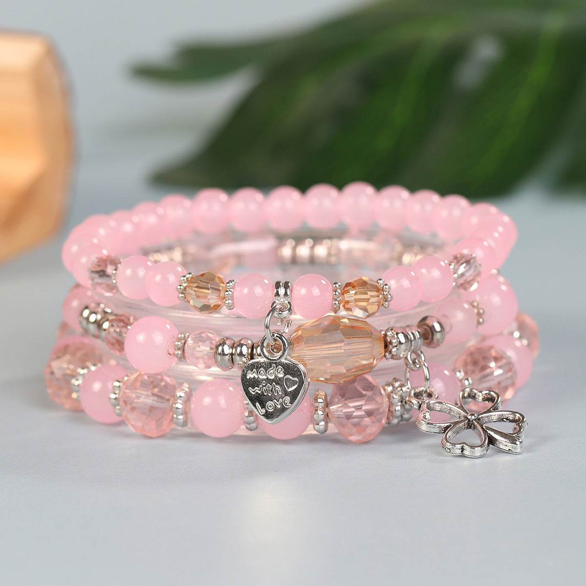 Wholesale Four Leaf Grass Heart Multi Layered Pendant Glass Elastic Bracelet