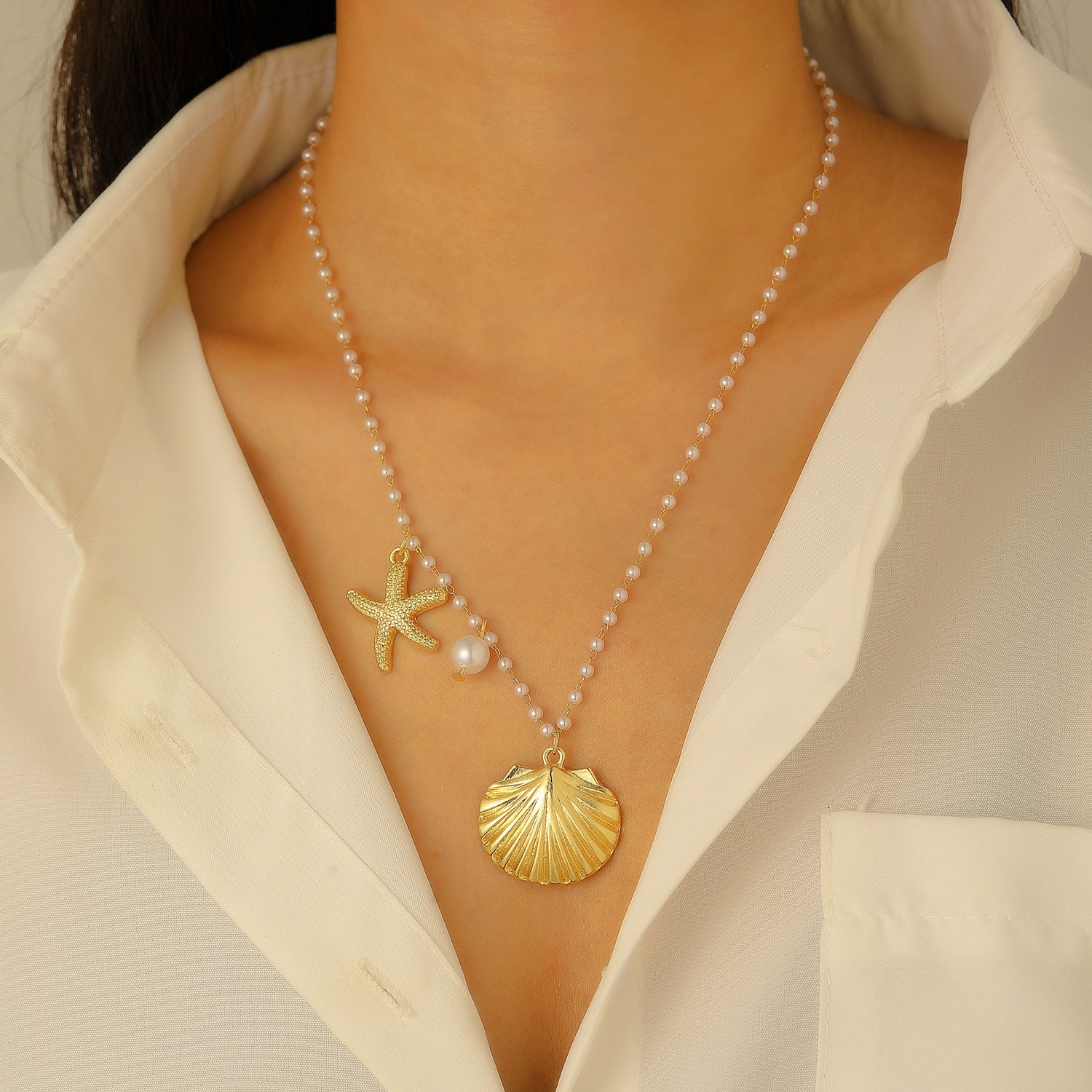 Wholesale Electroplated Alloy Bohemian Beach Shell Necklace And Bracelet Set For Women Faux Pearl Starfish Conch Fashion Accessory