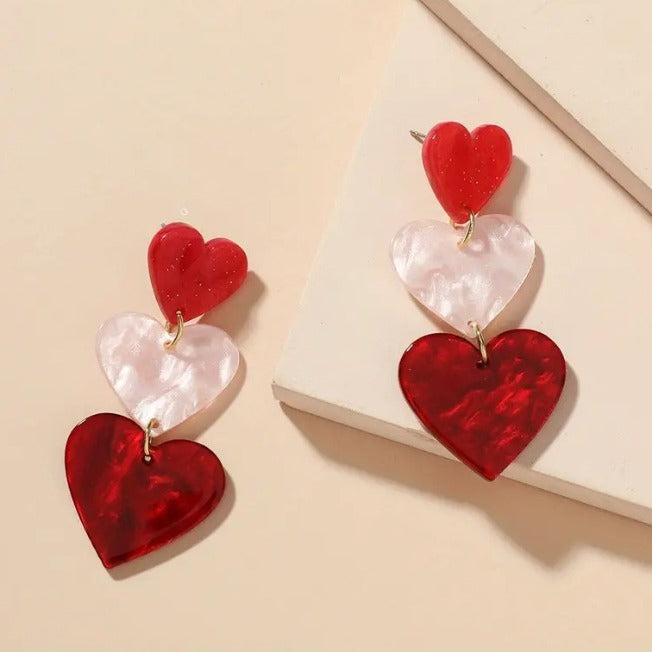 Wholesale  Heart-shaped Stud Earrings With a Triple Dangle Design.
