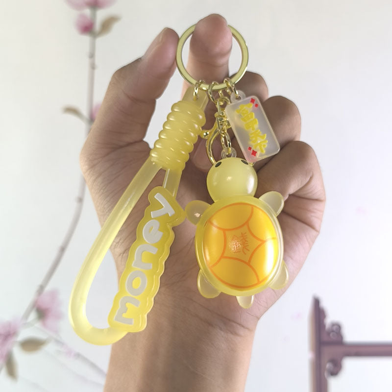 Wholesale Internet Celebrous Luminous Money Little Turtle Keychain Cute School Bag Pendant Key Chain Accessories Doll Machine Gift Keychains