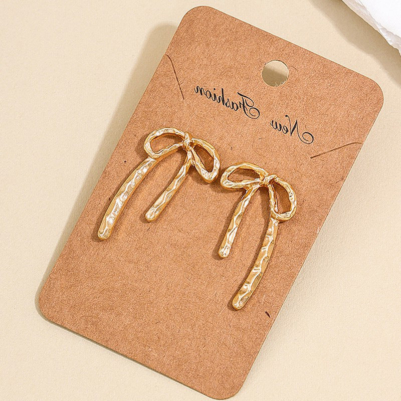 wholesale new INS metal style simple hollow bow earrings