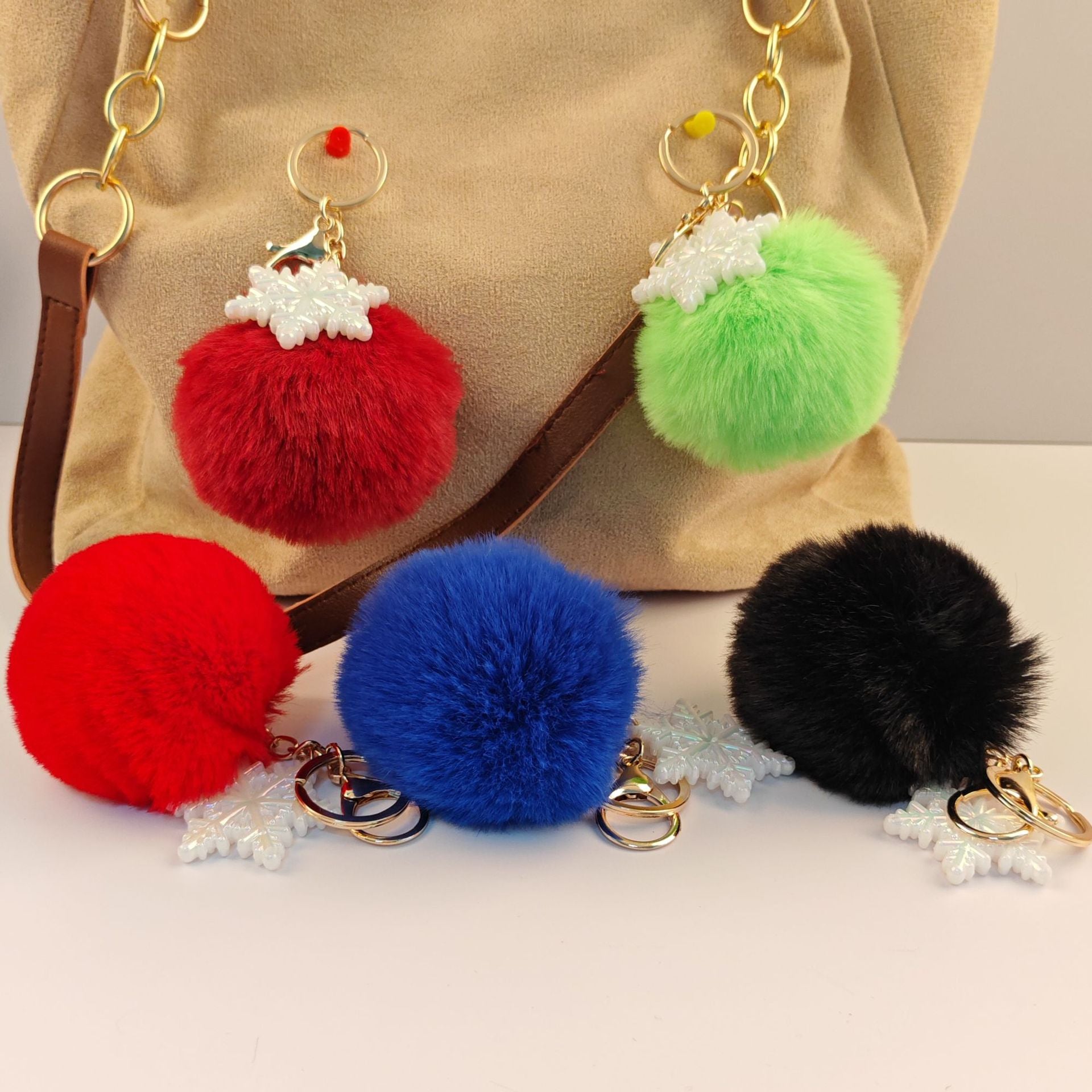 Wholesale Snowflake fur ball keychain