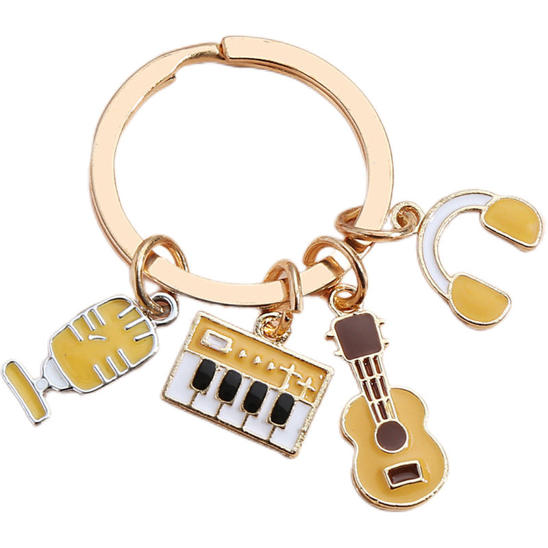 Wholesale Piano Keyboard Earphone Microphone Combination Dripping Oil Metal Keychain