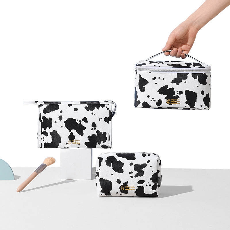 Wholesale Portable Storage Waterproof PU Cow Pattern Makeup Bag