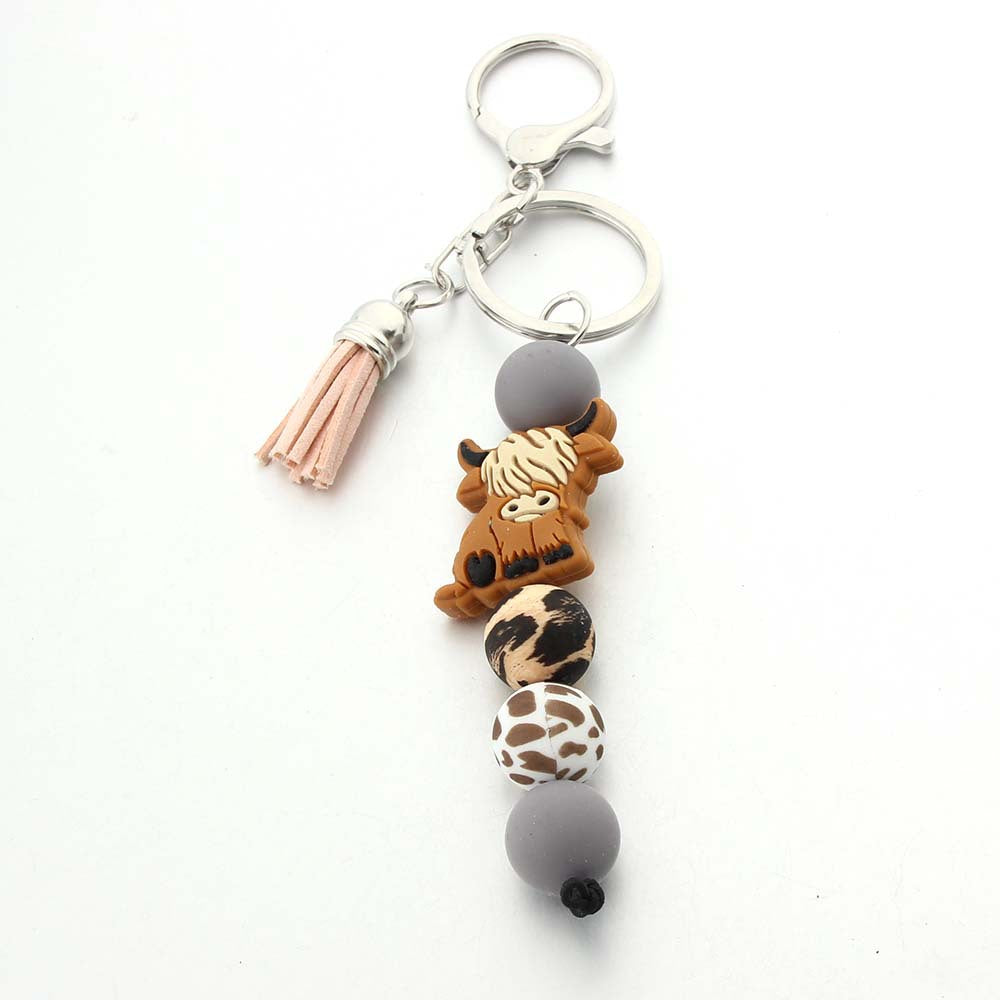 Wholesale Cartoon Cow Tooth Silicone Bead Keychain