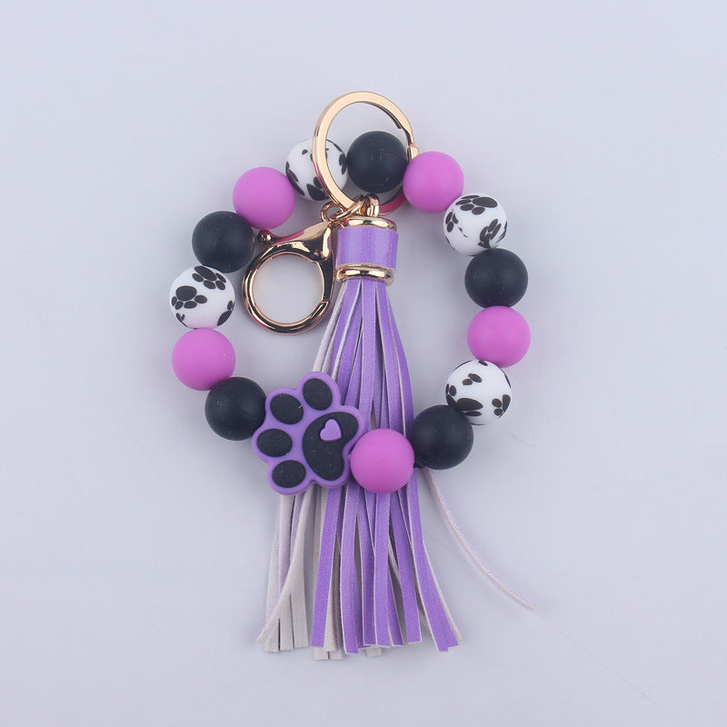 Wholesale Chic Silicone Bead Dog Paw Bracelet Keychain With Leather Tassel Fashion Gift For Resale