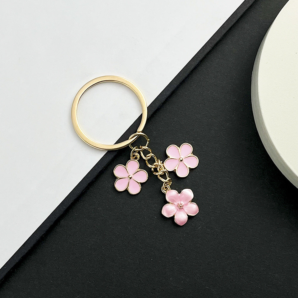 Wholesale black/ white/ blue/ pink/ purple multicolor optional luggage jewelry keychain
