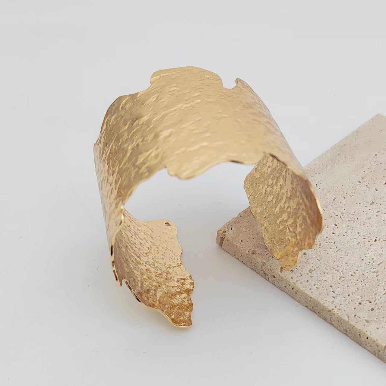 Wholesale wide hammered pleated golden bracelet