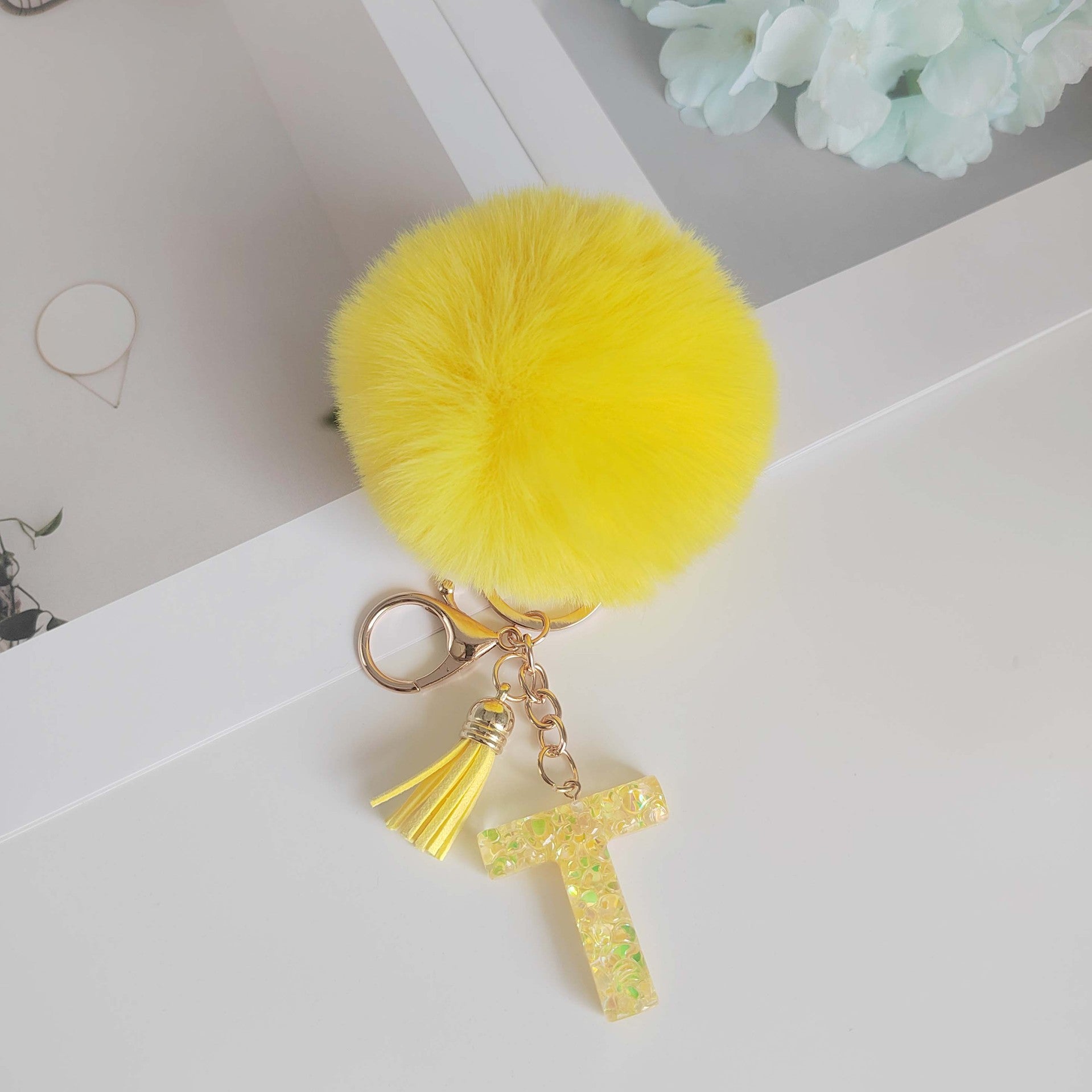 Wholesale Yellow letter ball pendant flower shaped letter keychain