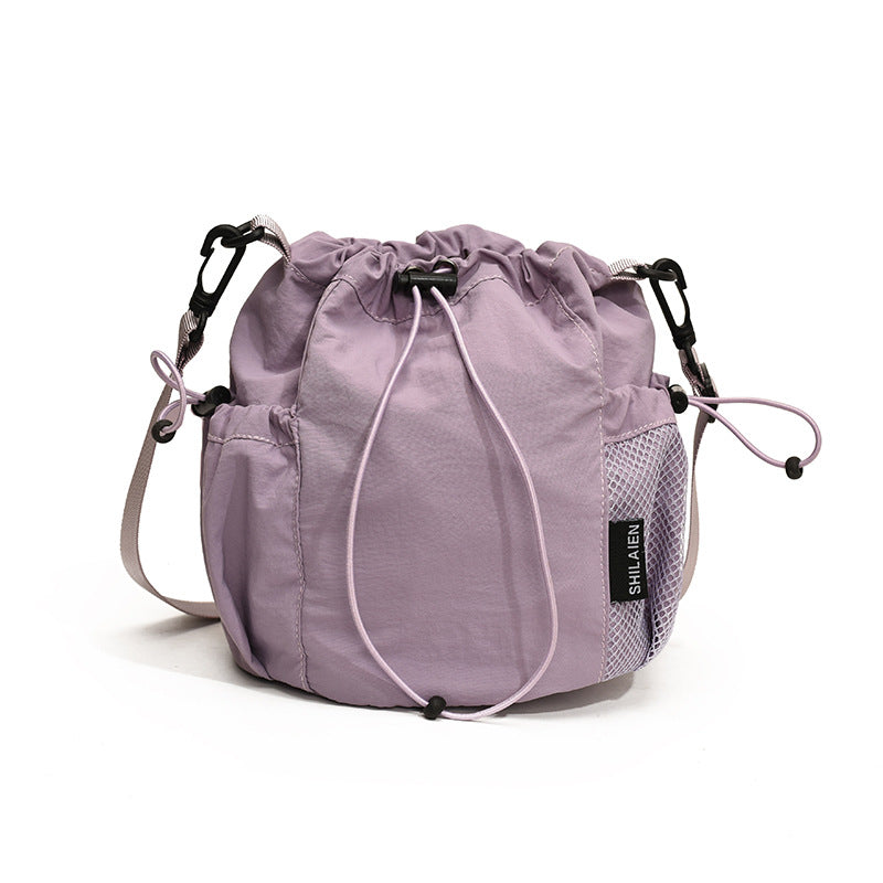 Wholesale Japanese style drawstring bucket versatile nylon messenger bag