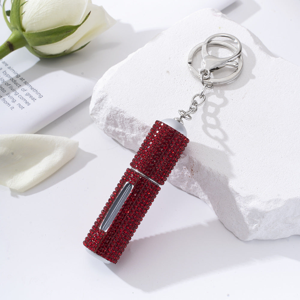 Wholesale  diamond-studded creative perfume bottle keychain is easy to carry