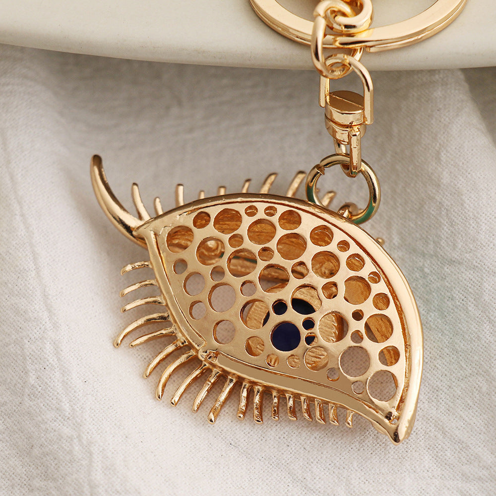 Wholesale Creative Devil's Eye Metal Diamond Keychain