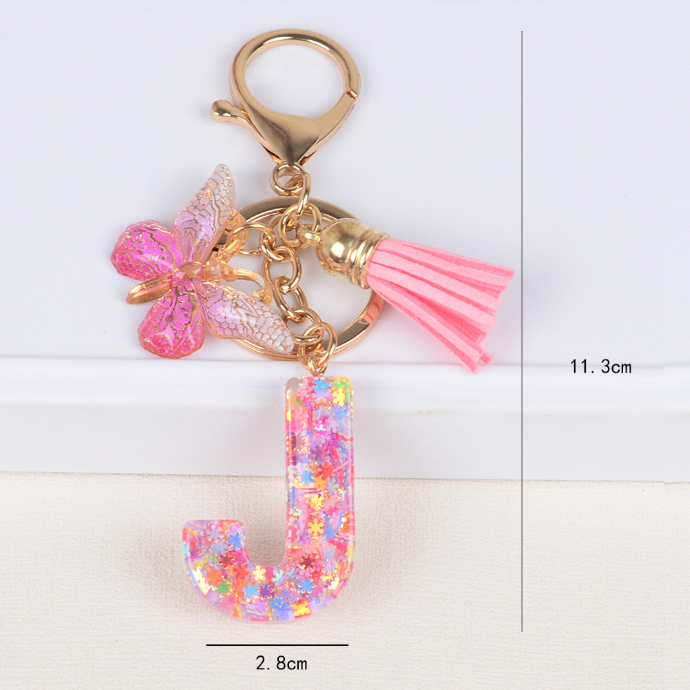 卸売スパンコールスノーフレークレター樹脂キーホルダー