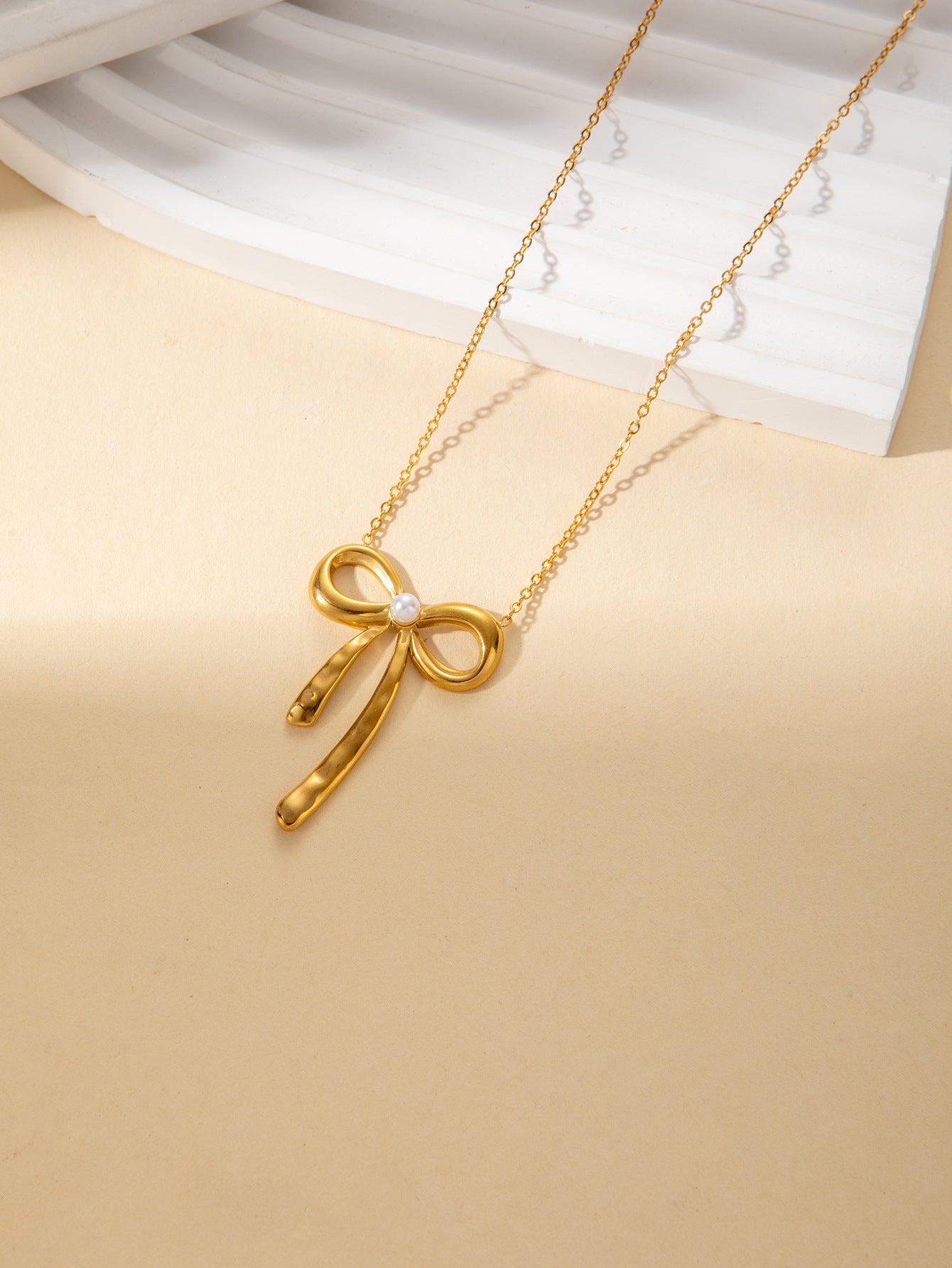 Wholesale titanium steel necklace gold luxury creative bow necklace