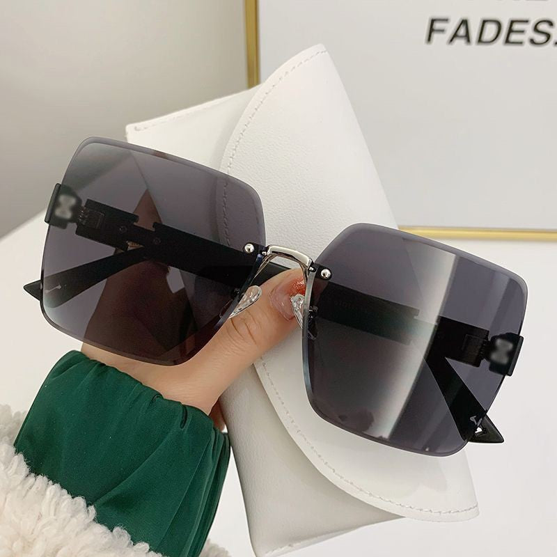 Wholesale Frameless Trimmed Large Frame Gradient Lens Sunglasses
