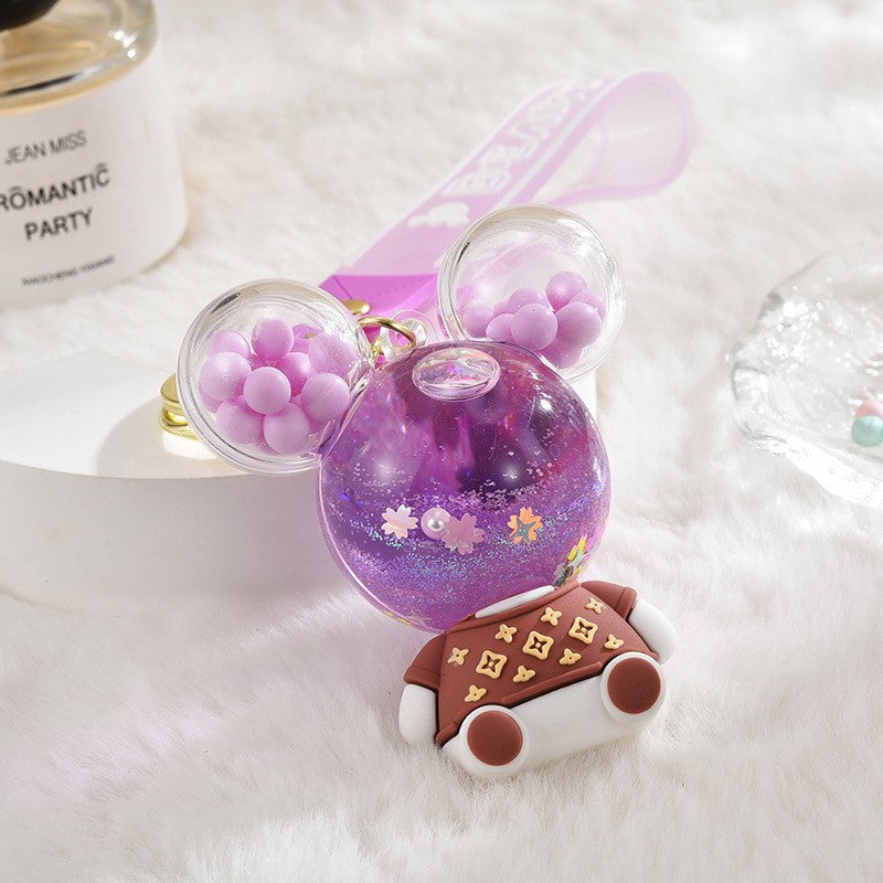 Wholesale Acrylic flowing sand bottle bag keychain