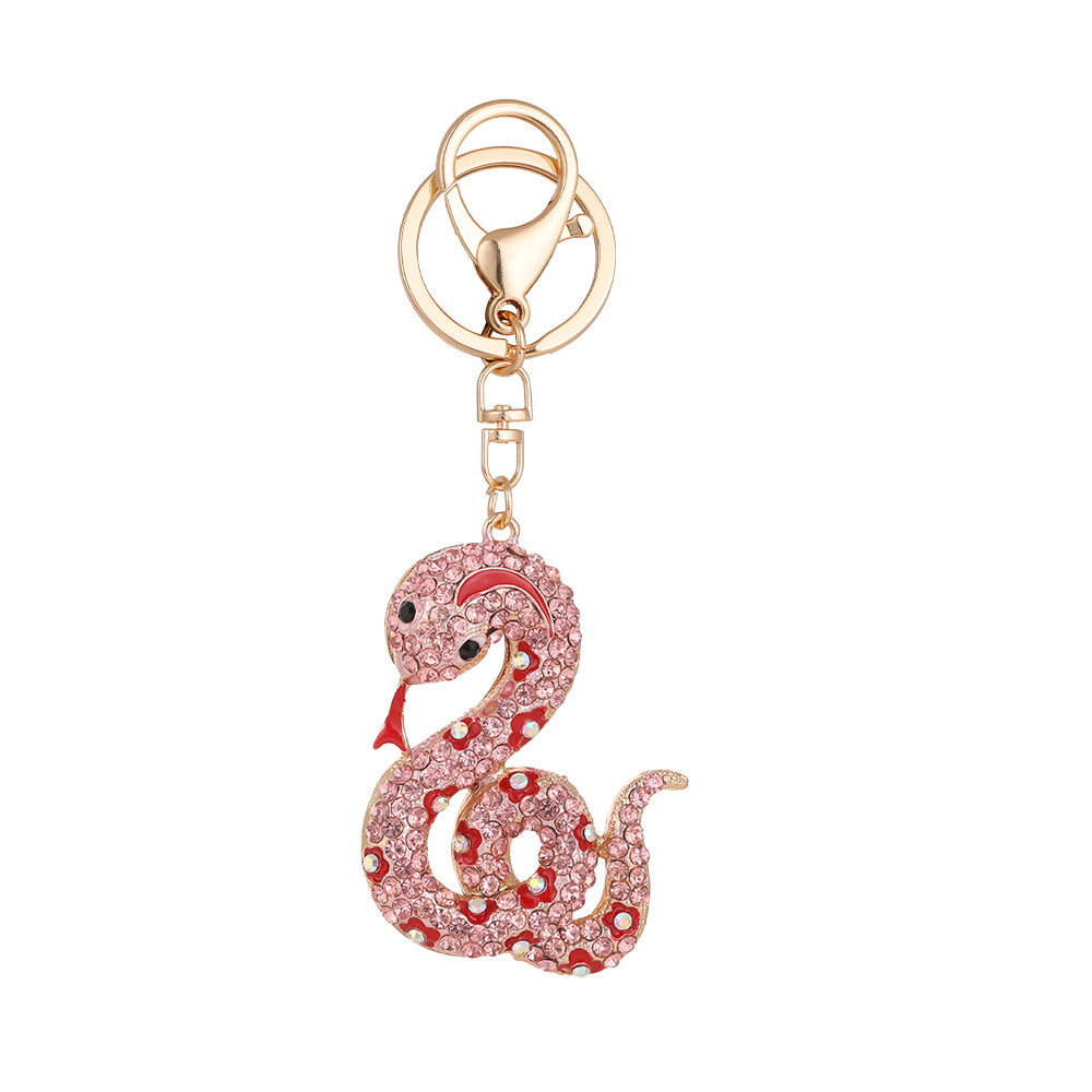 Wholesale Creative cartoon diamond twelve zodiac snake metal car keychain national tide this year pendant small gifts