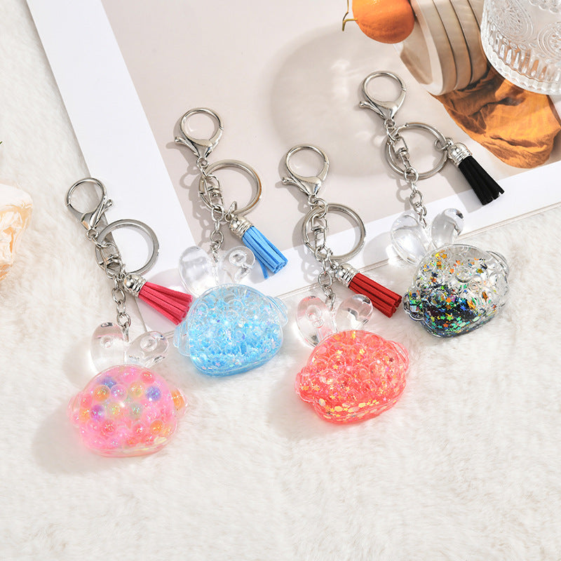 Wholesale colorful acrylic oil bottle tassel keychain