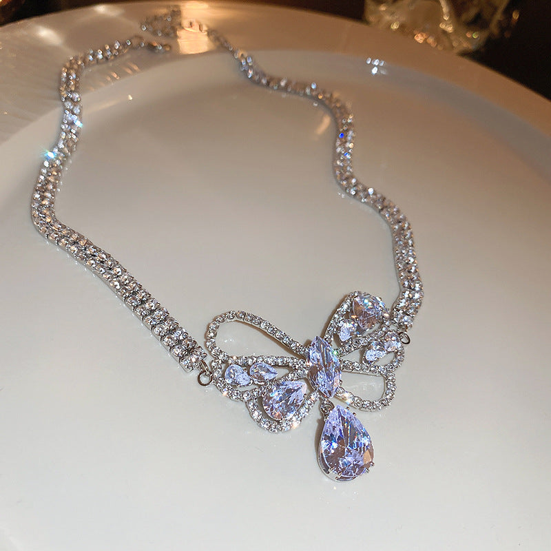 Wholesale Zircon Hollow Bow Teardrop Earrings Necklace Set