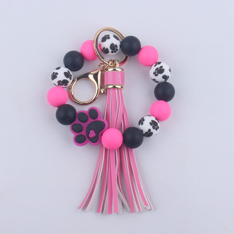 Wholesale Chic Silicone Bead Dog Paw Bracelet Keychain With Leather Tassel Fashion Gift For Resale